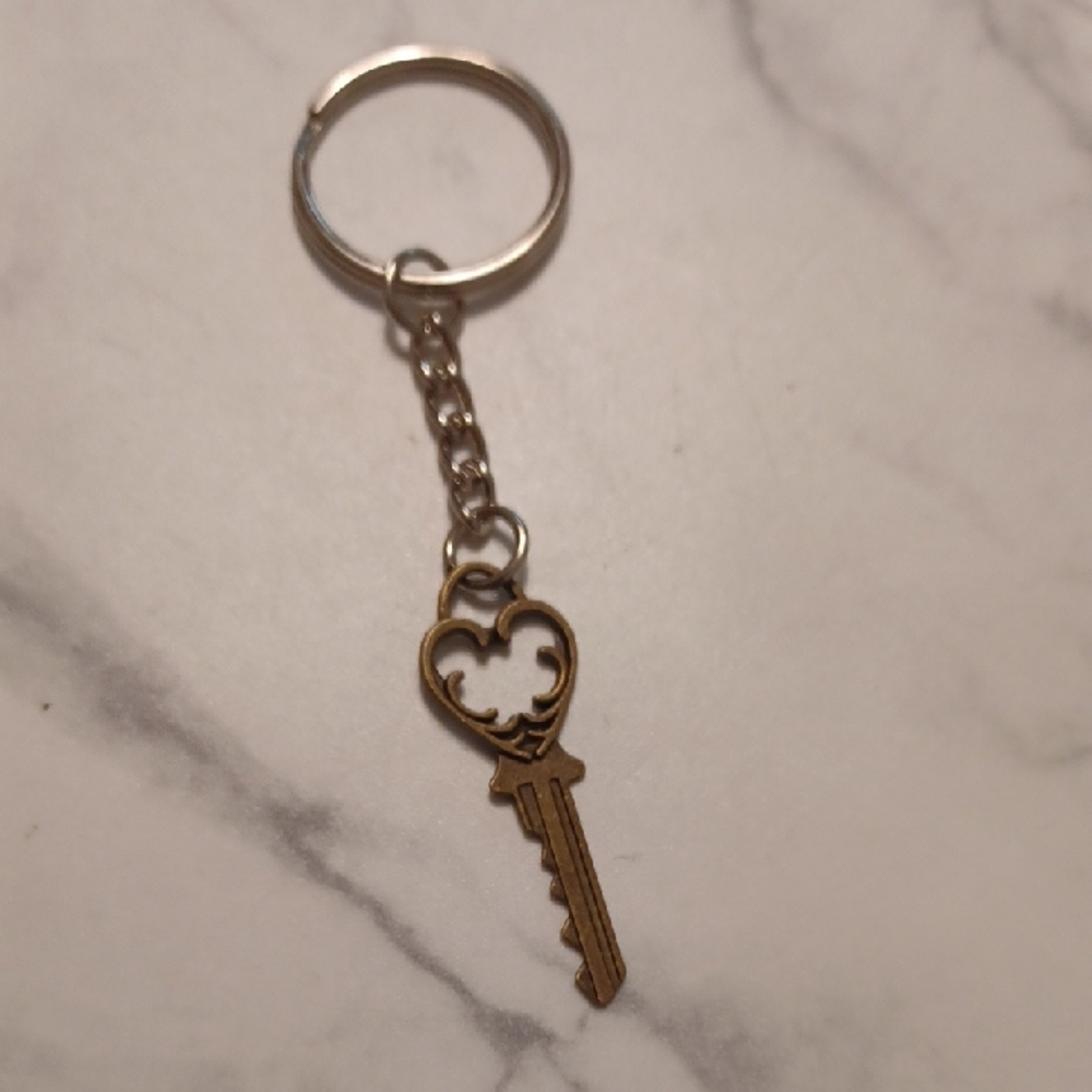 4/$40 New Bronze Heart Key Shaped Keychain